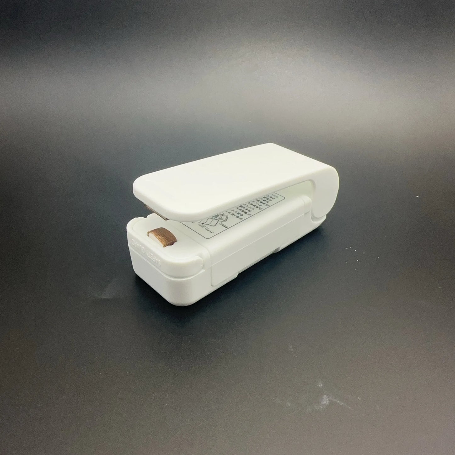 Mini seladora de sacos térmicos para alimentos.
